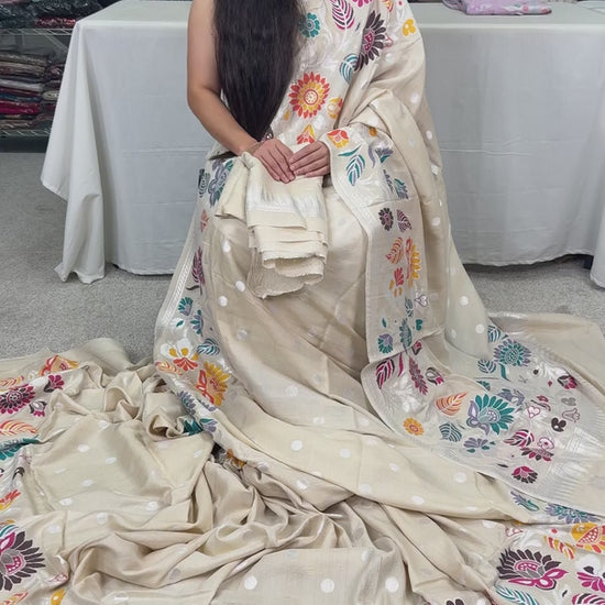 video of Beige Tussar Georgette Banarasi Saree with Paithani Minakari Border.