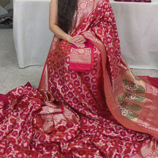 Video of Exclusive Coral Pink Bridal Banarasi Saree with Minakari Jaal Weaving.