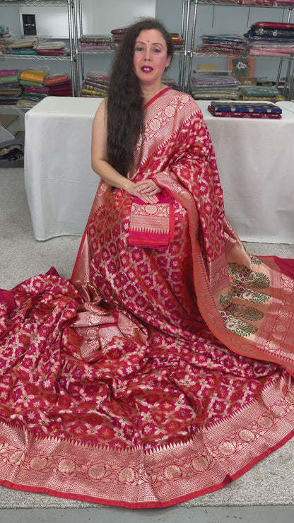 Video of Exclusive Coral Pink Bridal Banarasi Saree with Minakari Jaal Weaving.
