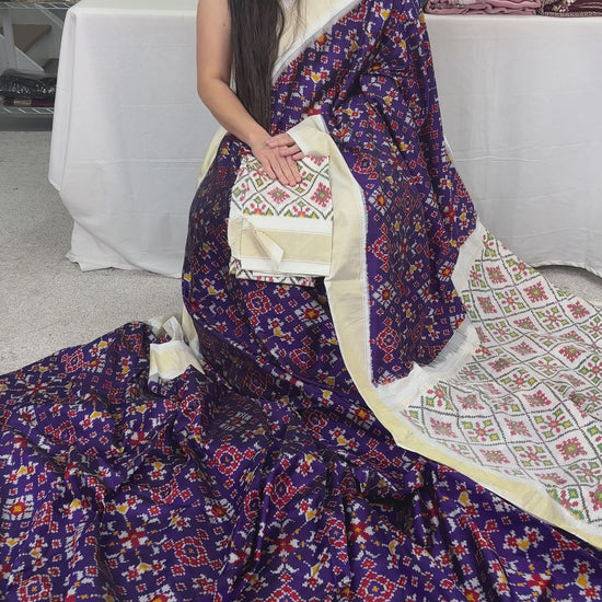 Video of Malathi : Silk Mark Certified Navarathan Patola Saree in Purple and Off White