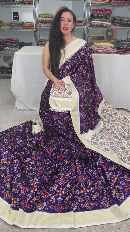 Video of Malathi : Silk Mark Certified Navarathan Patola Saree in Purple and Off White