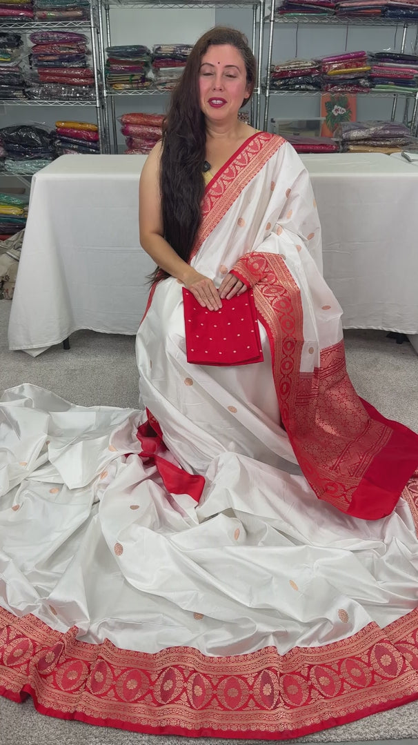 Video of White and Red Handwoven Katan Silk Banarasi Saree.