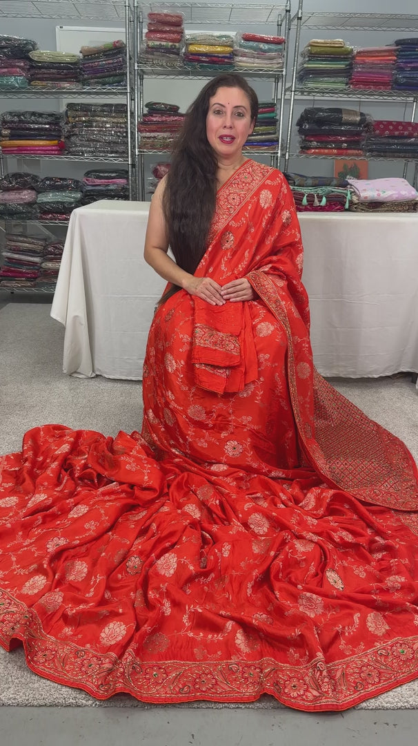 Video of Orange and Gold Dola Silk Banarasi Saree – with Hand Embroidery.