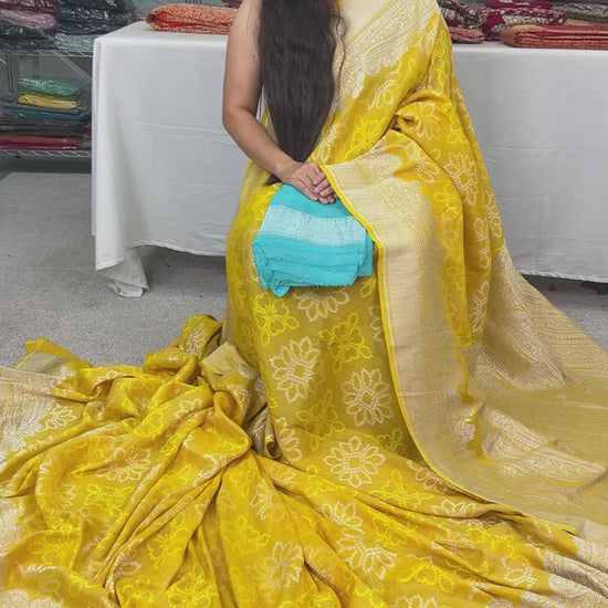 Video of Yellow Bandhani Tussar Georgette Banarasi Saree.