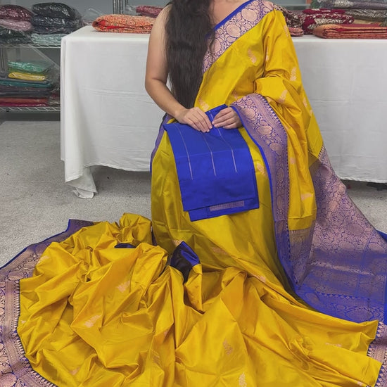 Video of Yellow Pure Katan Banarasi Silk Saree with Gold Zari.