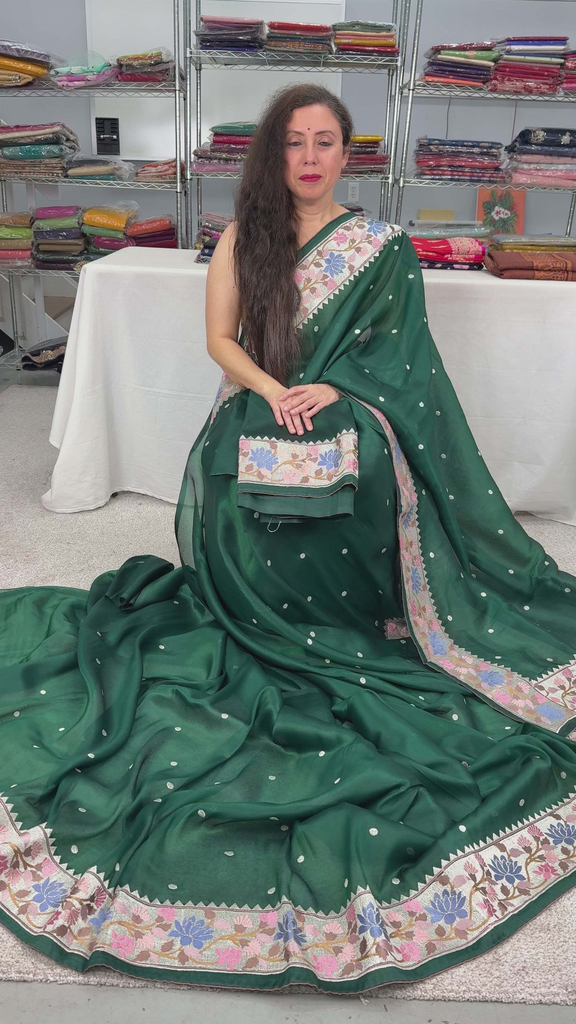 video of Bottle Green Thread Embroidery Party Wear Organza Saree.
