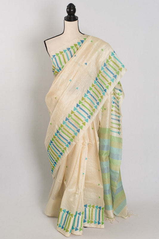 Rini: Cream Tussar Silk Saree with Blue & Green Motifs | Silk Mark Certified - Saree Mandi