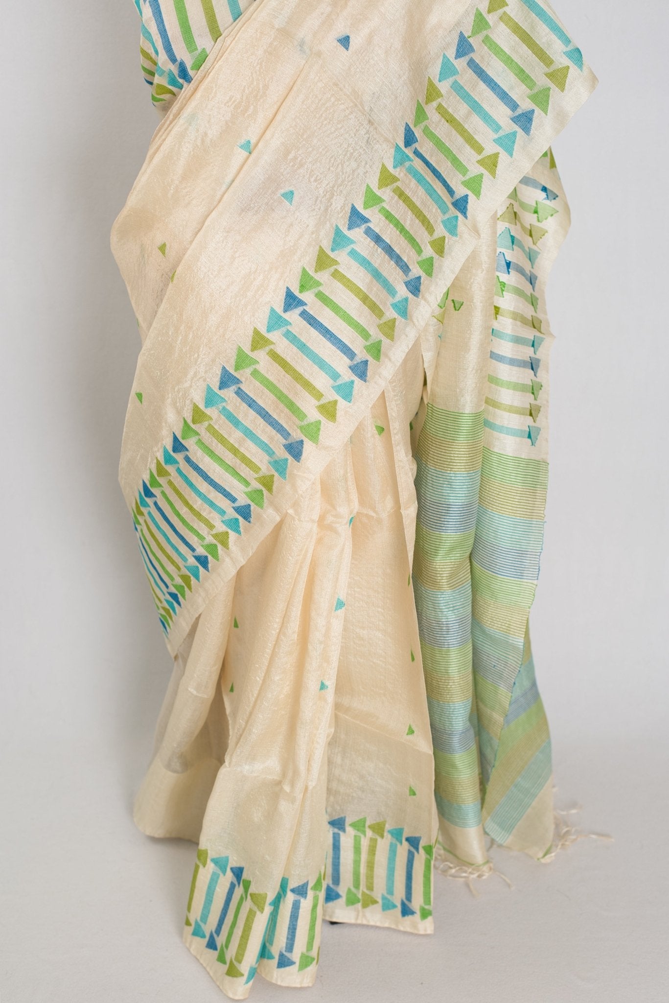 Rini: Cream Tussar Silk Saree with Blue & Green Motifs | Silk Mark Certified - Saree Mandi