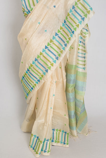 Rini: Cream Tussar Silk Saree with Blue & Green Motifs | Silk Mark Certified - Saree Mandi