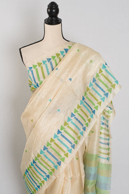 Rini: Cream Tussar Silk Saree with Blue & Green Motifs | Silk Mark Certified - Saree Mandi