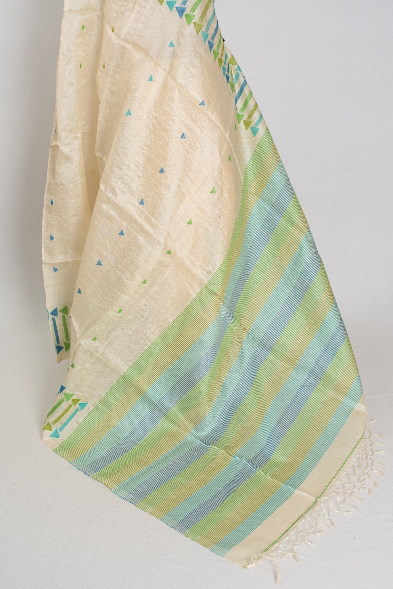 Rini: Cream Tussar Silk Saree with Blue & Green Motifs | Silk Mark Certified - Saree Mandi
