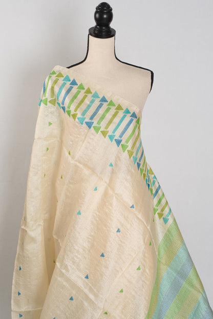 Rini: Cream Tussar Silk Saree with Blue & Green Motifs | Silk Mark Certified - Saree Mandi