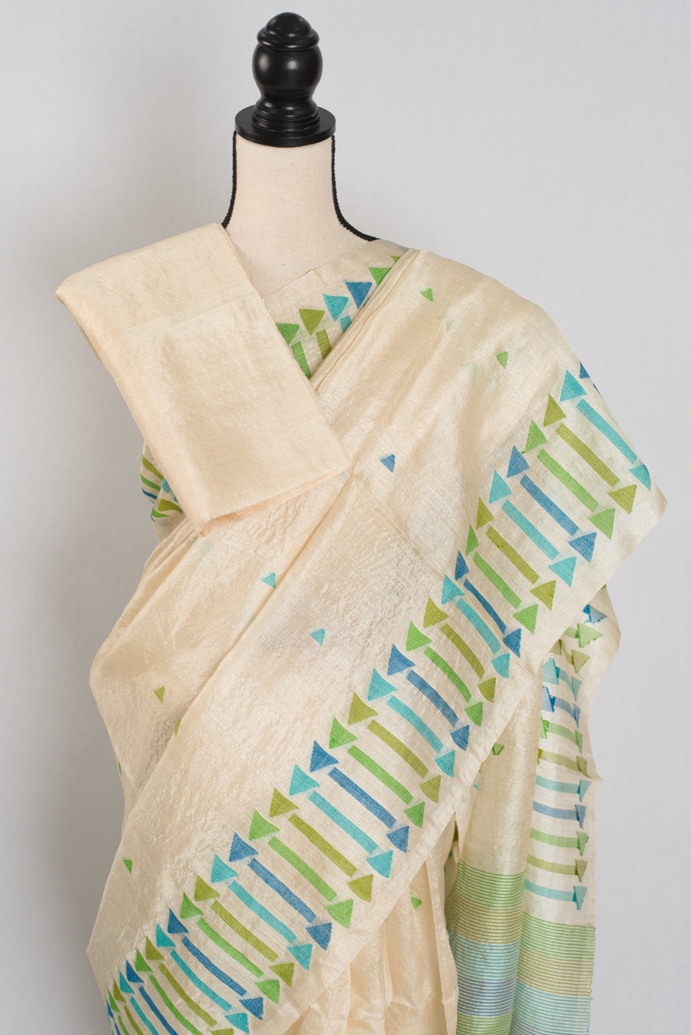 Rini: Cream Tussar Silk Saree with Blue & Green Motifs | Silk Mark Certified - Saree Mandi