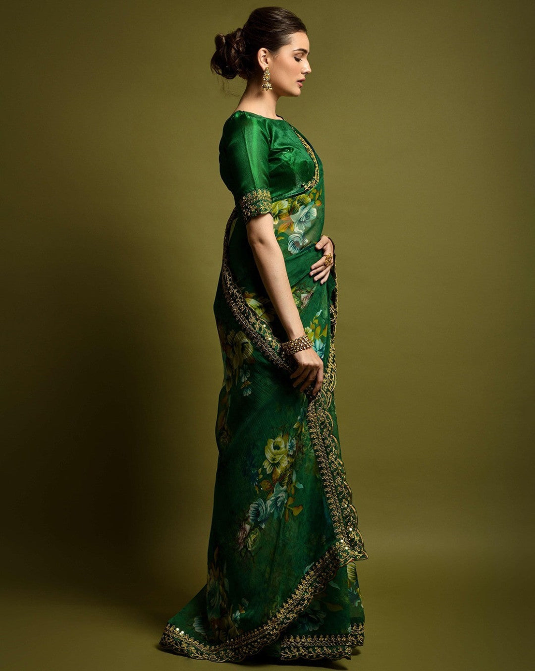 Designer Floral Georgette Partywear Saree in Green.