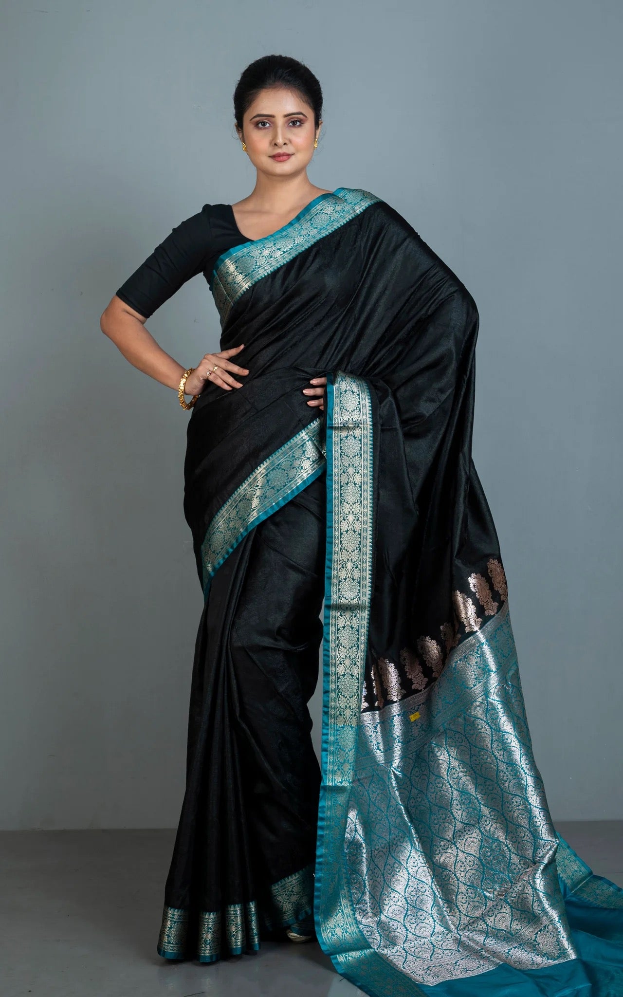 Blended Silk Gadwal Saree with Rich Pallu in Black, Teal and Antique Golden.