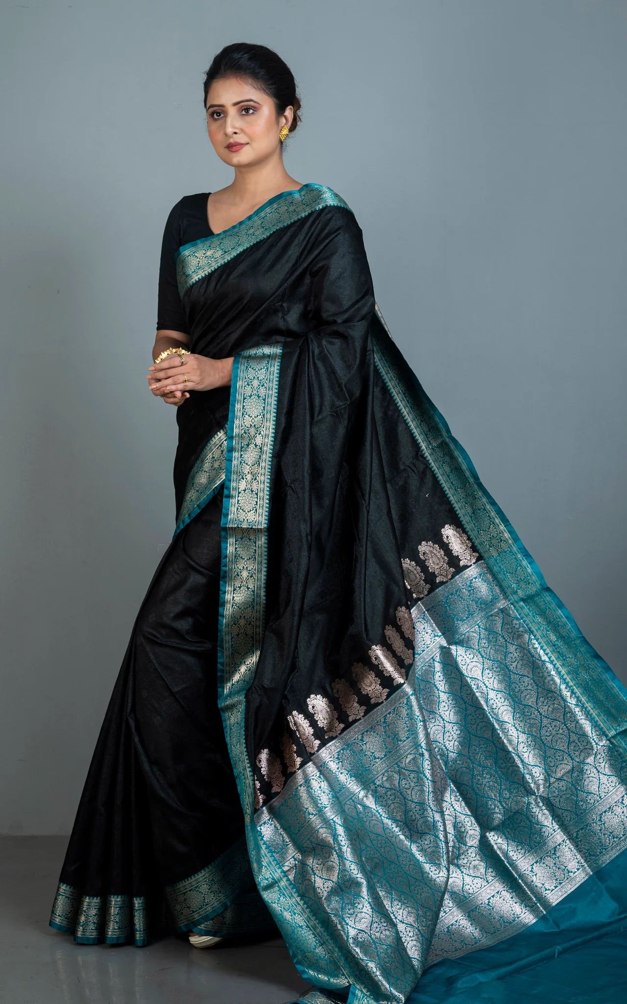 Blended Silk Gadwal Saree with Rich Pallu in Black, Teal and Antique Golden.