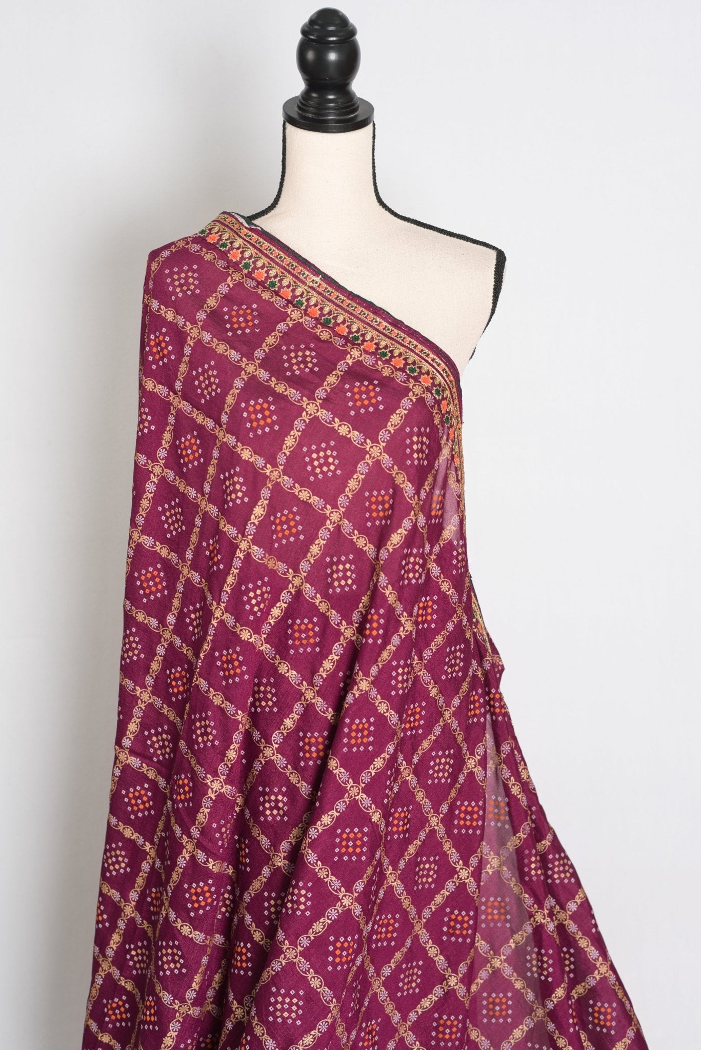 Suma : Purple Gharchola Gold Printed Saree with Embroidered Border - Saree Mandi