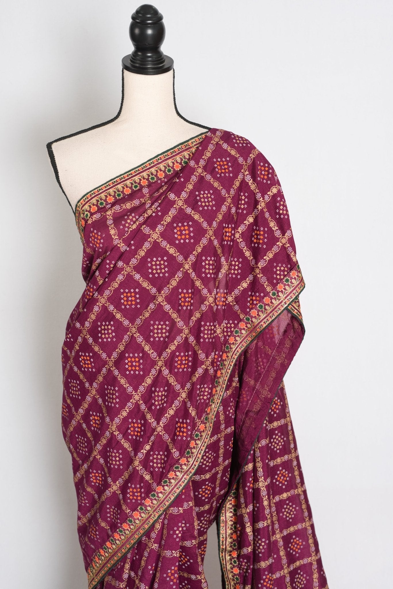 Suma : Purple Gharchola Gold Printed Saree with Embroidered Border - Saree Mandi