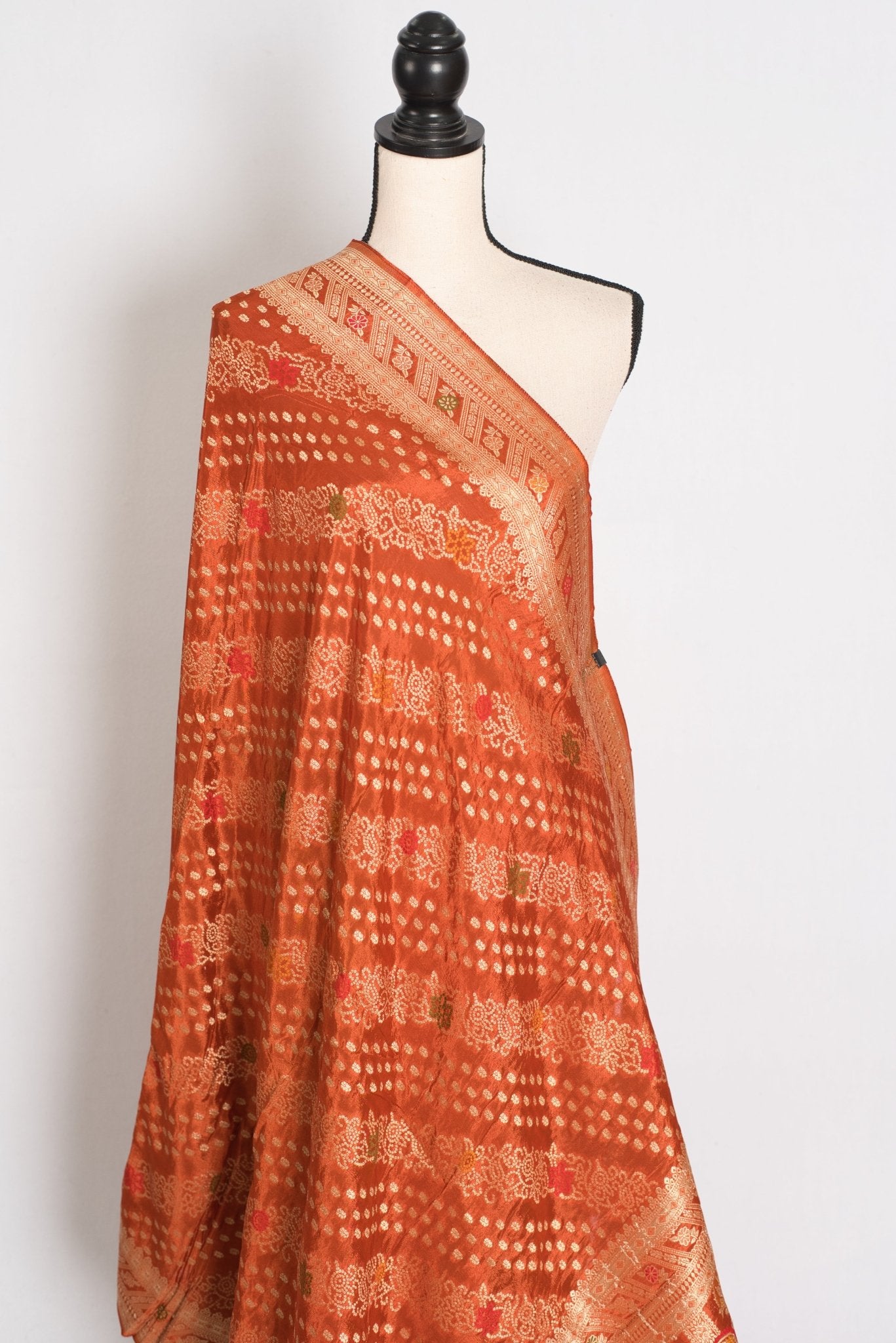 Sumi : Rust Orange & Gold Semi Mashru Bandhani Saree - Saree Mandi