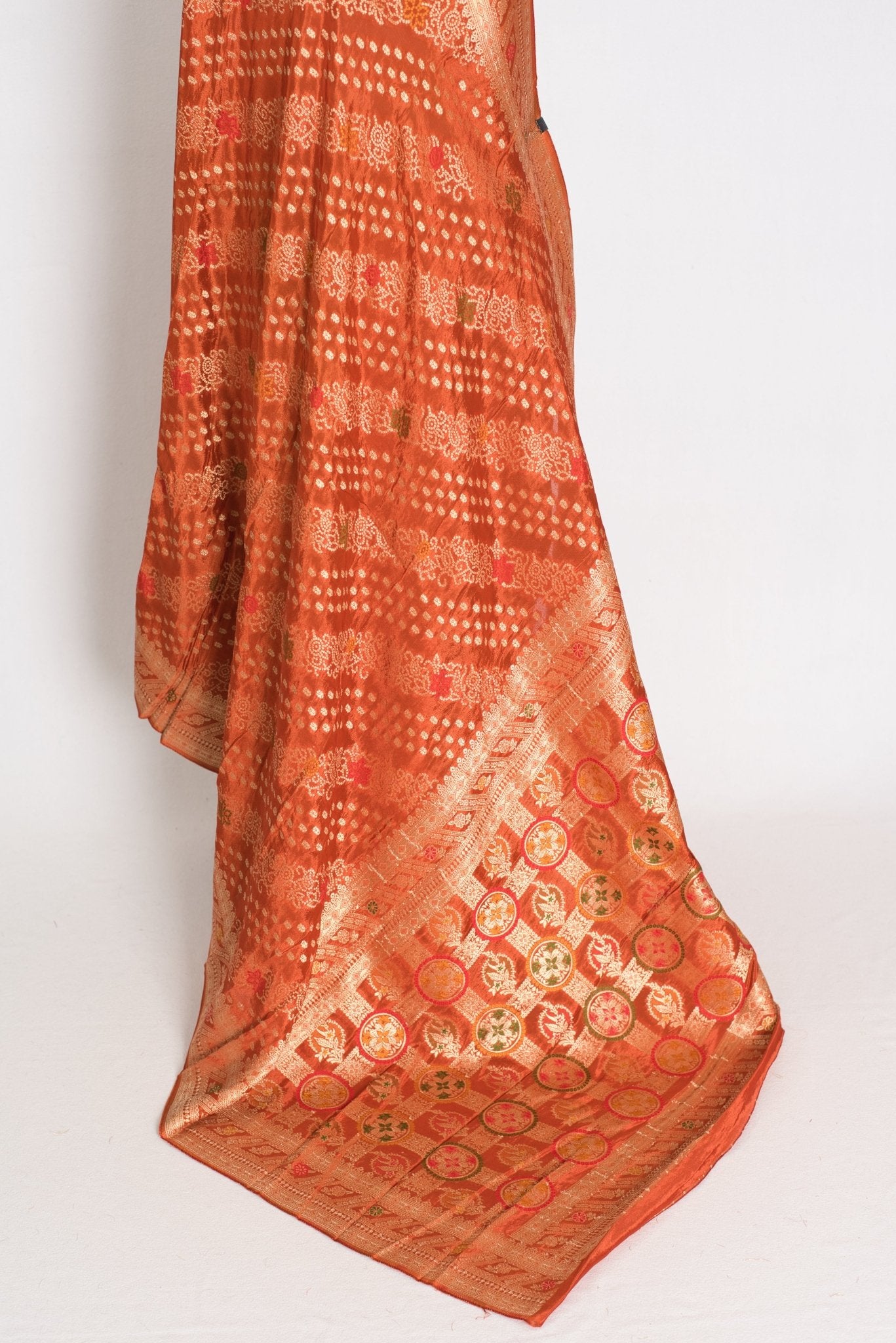 Sumi : Rust Orange & Gold Semi Mashru Bandhani Saree - Saree Mandi