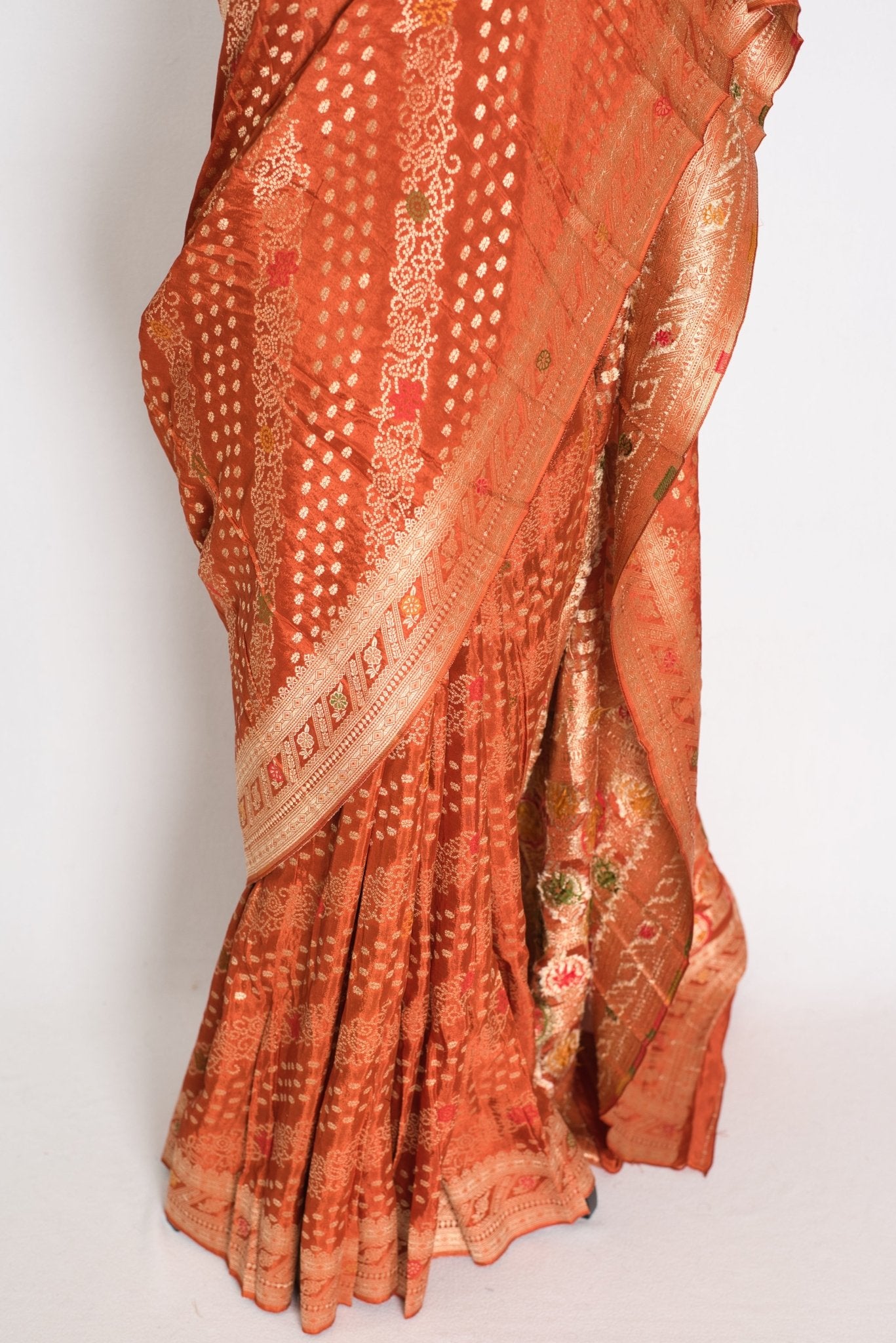 Sumi : Rust Orange & Gold Semi Mashru Bandhani Saree - Saree Mandi