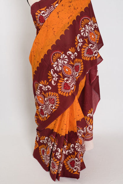 Trina: Orange & Red Batik Printed Mulmul Cotton Saree | Lightweight Handloom - Saree Mandi