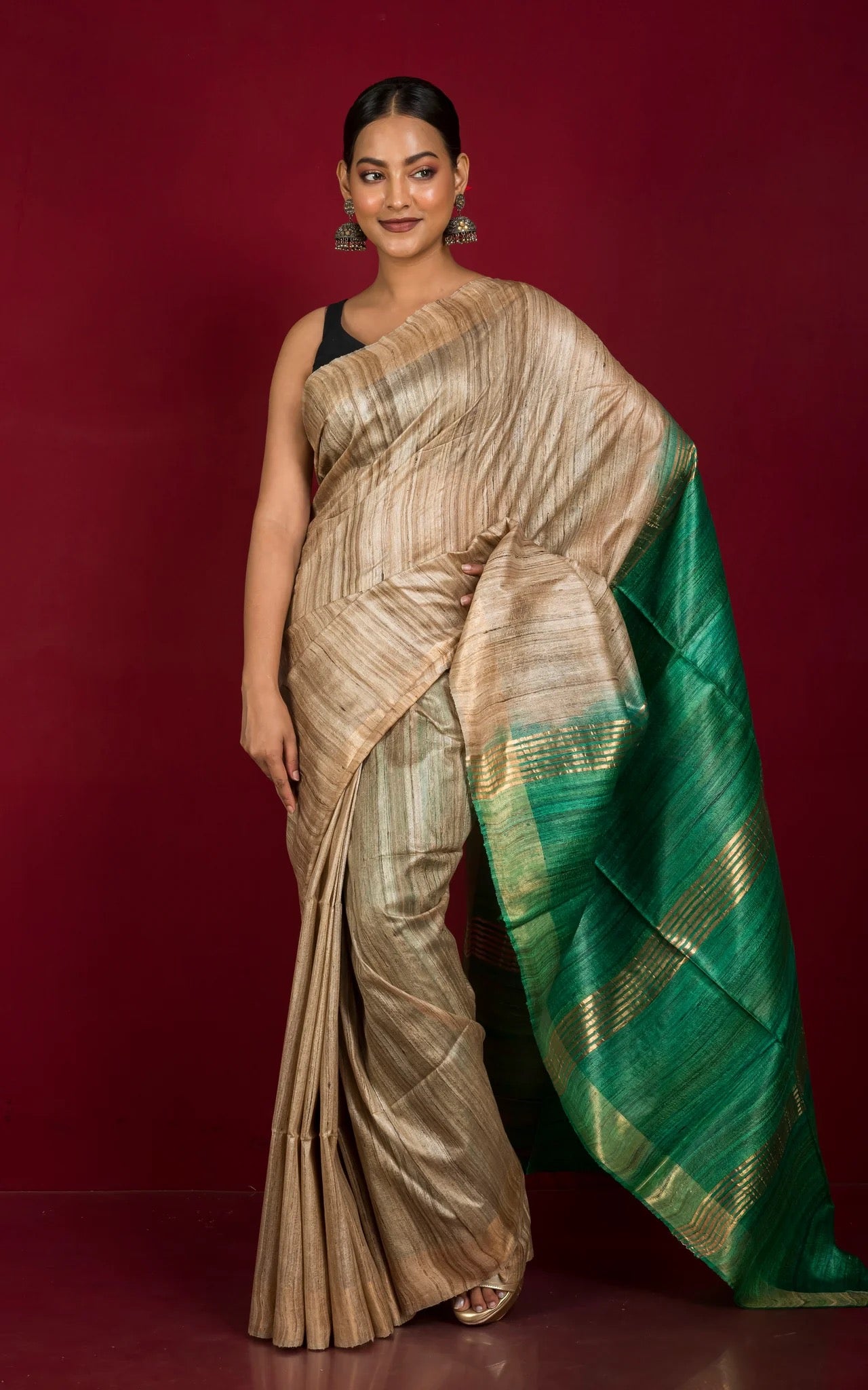 Gicha Tussar Saree in Natural Tussar Color and Emerald Green.