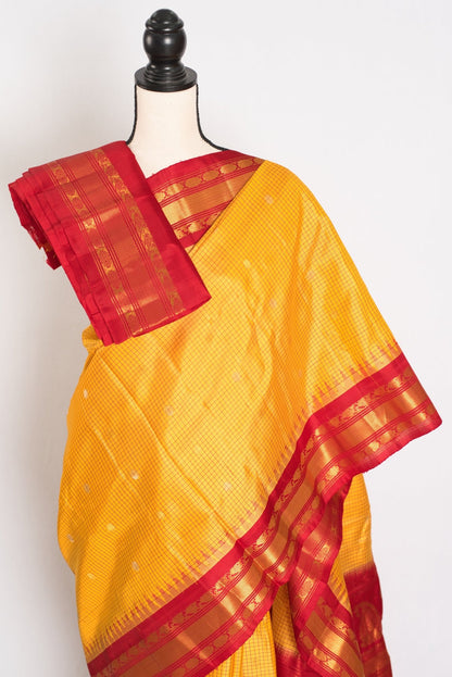 Vibha: Haldi Yellow and Red Checks Handwoven Gadwal Silk Saree with Golden Zari - Saree Mandi
