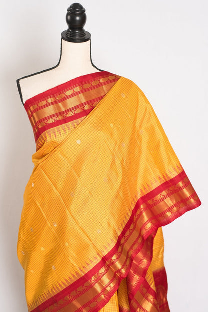 Vibha: Haldi Yellow and Red Checks Handwoven Gadwal Silk Saree with Golden Zari - Saree Mandi