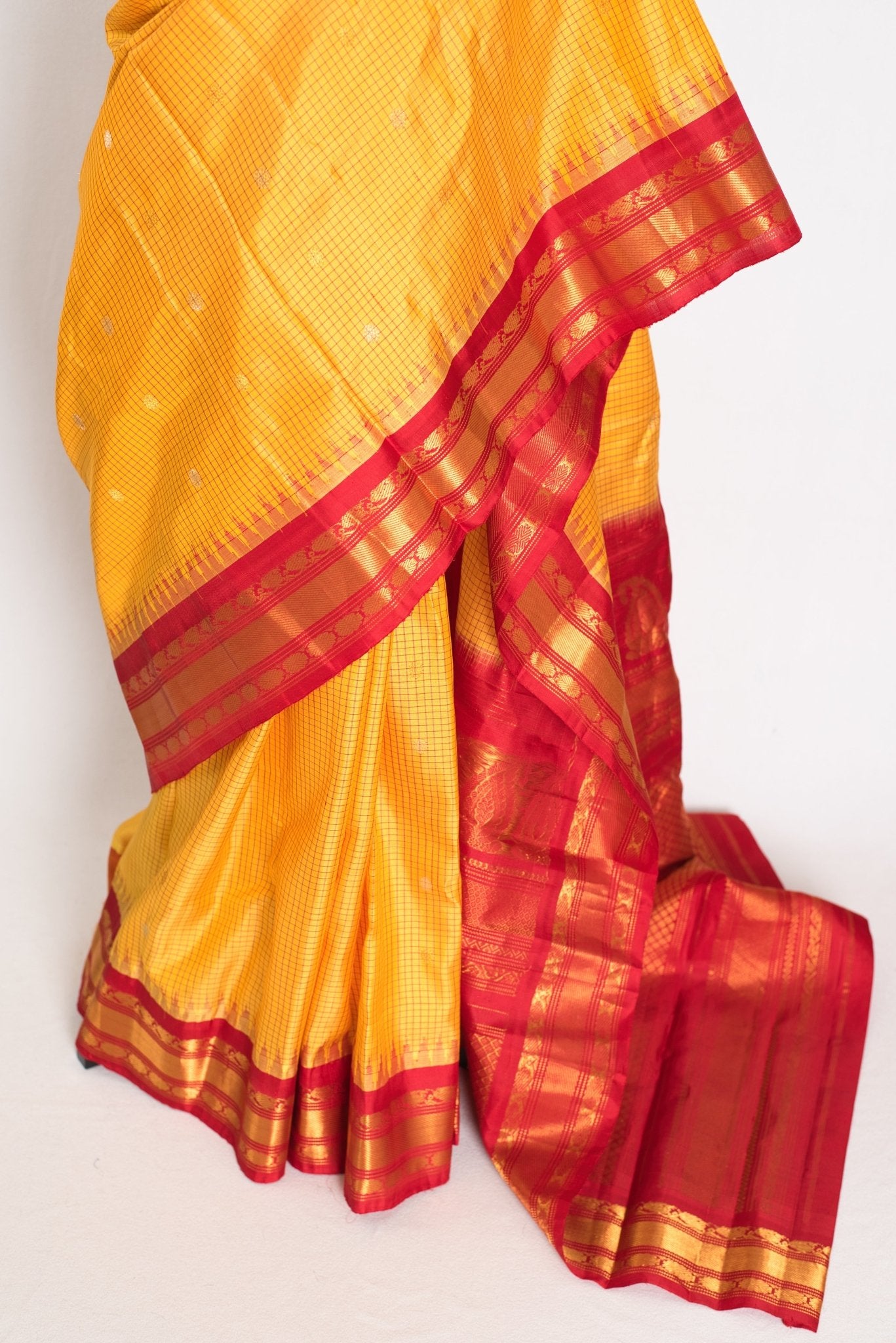 Vibha: Haldi Yellow and Red Checks Handwoven Gadwal Silk Saree with Golden Zari - Saree Mandi